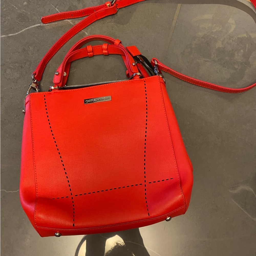 Gorgeous red Charles Jourdan bag. Can be cross body or dressier w small handles.